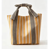 MKS AMERICA:  MINI STRIPE BOW HANDLE BAG