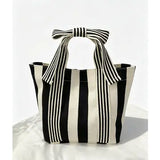 MKS AMERICA:  MINI STRIPE BOW HANDLE BAG