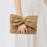 MKS AMERICA:  BOW STRAW CLUTCH BAG