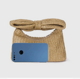 MKS AMERICA:  BOW STRAW CLUTCH BAG