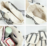 MKS AMERICA:  MINI STRIPE BOW HANDLE BAG