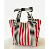 MKS AMERICA:  MINI STRIPE BOW HANDLE BAG